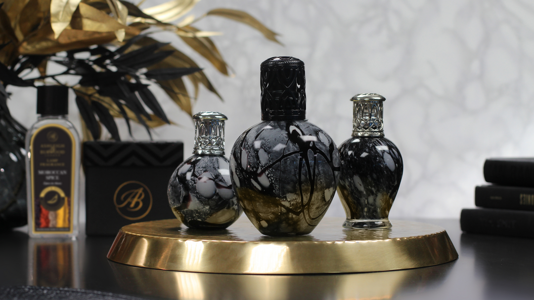 A picture of three mouthblown fragrance lamps