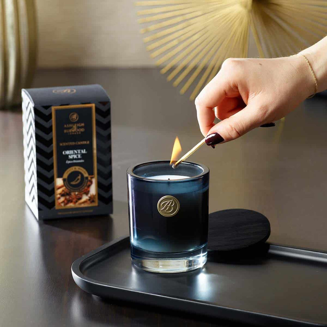 Oriental Spice Candle Being Lit