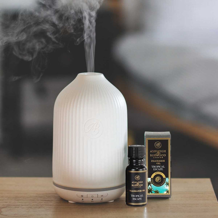 Tropical Escape Fragrance Oil next to an Ultrasonic Diffuser