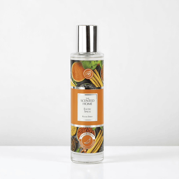 A bottle of Exotic Spices Room Spray against a white neutral background