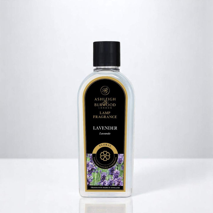 A bottle of Lavender Lamp Fragrance against a white neutral background