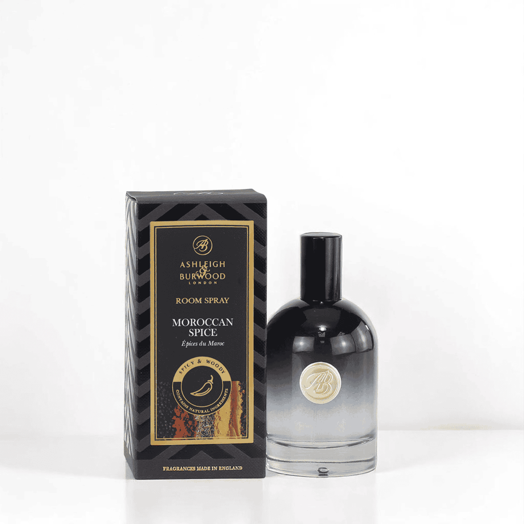 A bottle of Moroccan Spice Signature Room Spray against a white neutral background