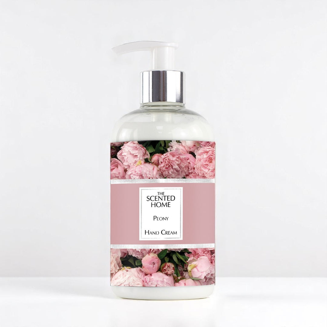 A bottle of Peony Handcream against a white neutral background