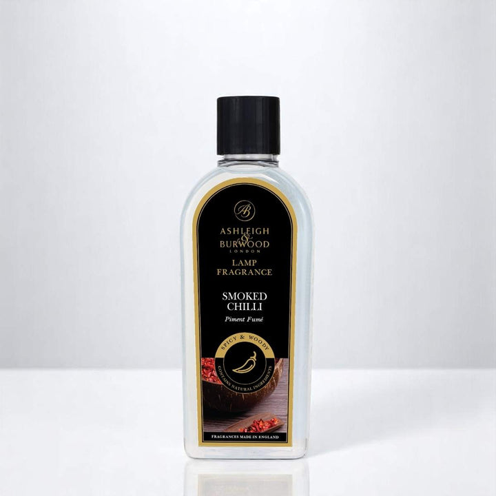 A bottle of Smoked Chilli Lamp Fragrance against a white neutral background