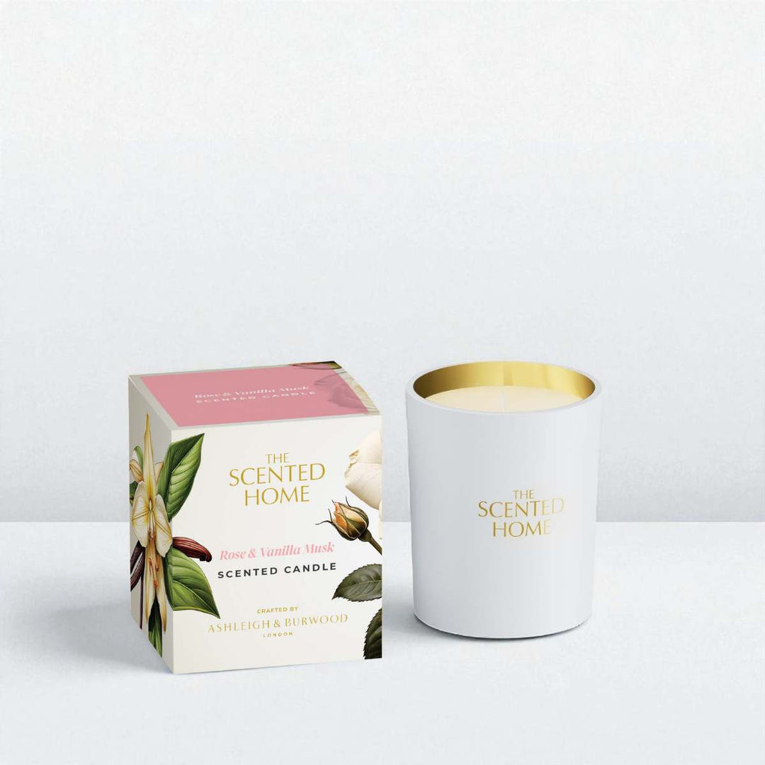 Scented candle with packaging on a light gray background