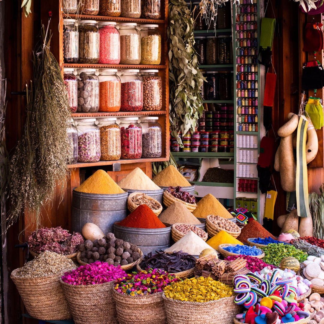 A Moroccan souk with baskets of spices