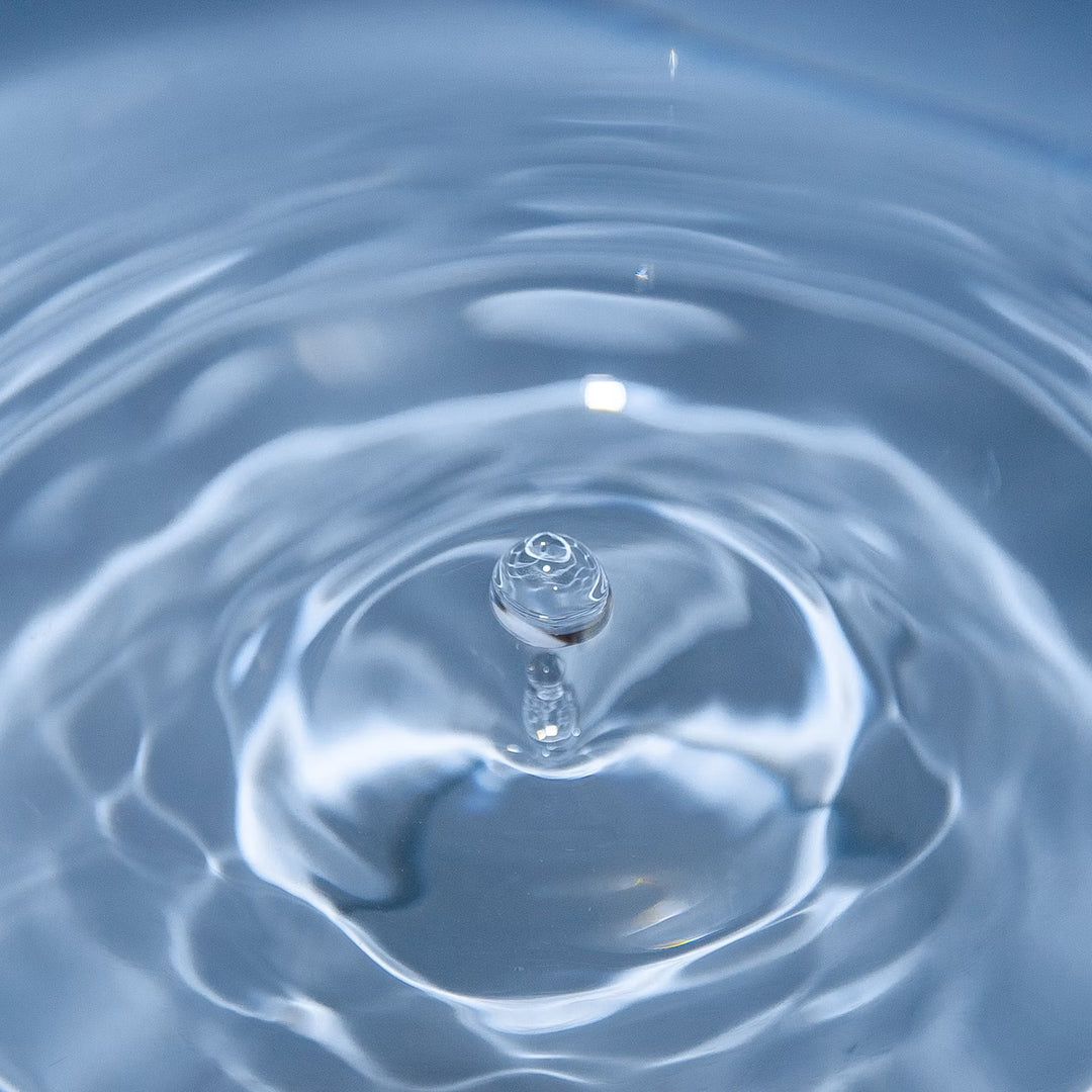 Droplet falling in clear water