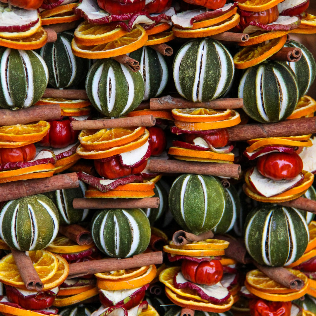 Strings of dried citrus and spice pomanders