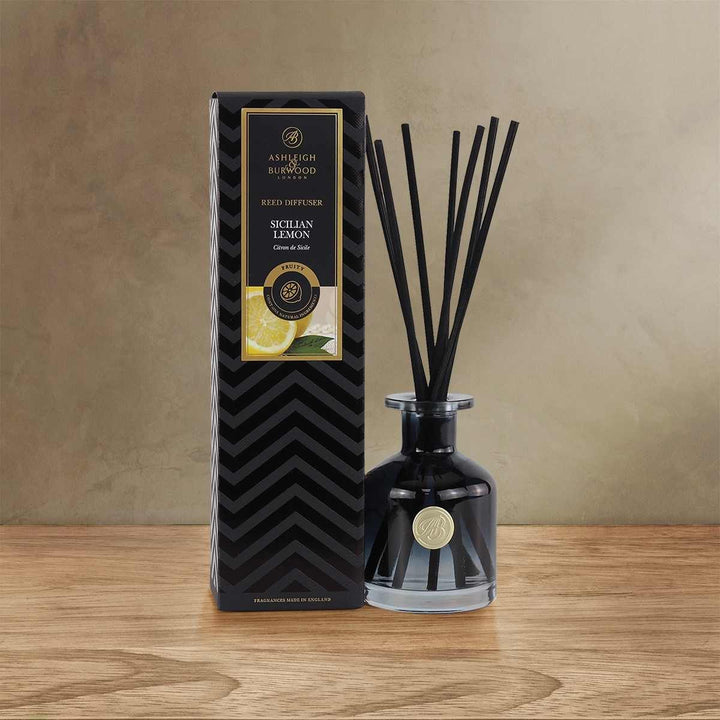 Sicilian Lemon Reed Diffuser on a wooden surface