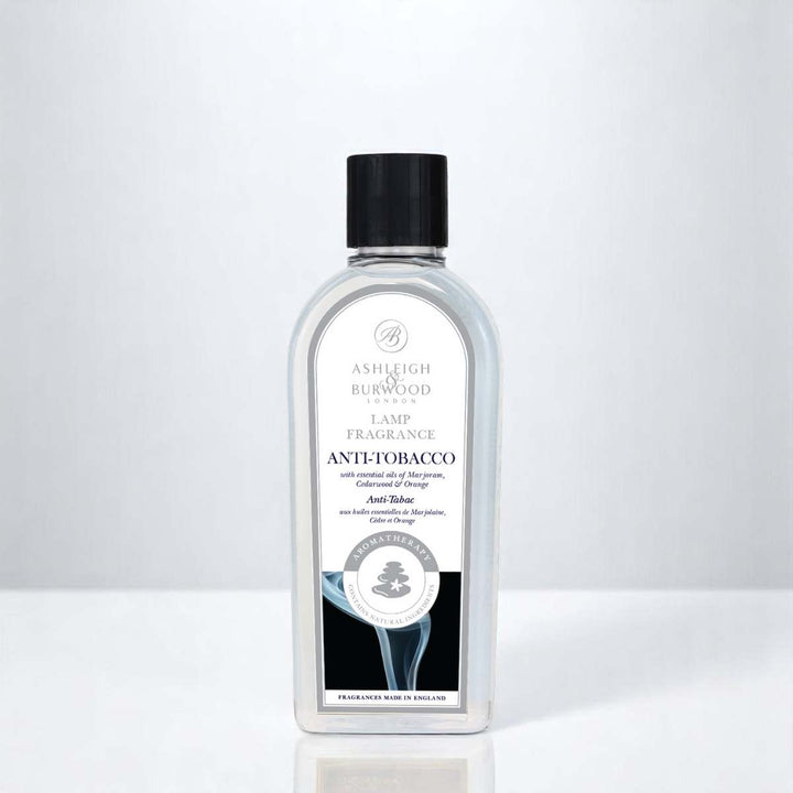 A bottle of Anti Tobacco Lamp Fragrance against a white neutral background