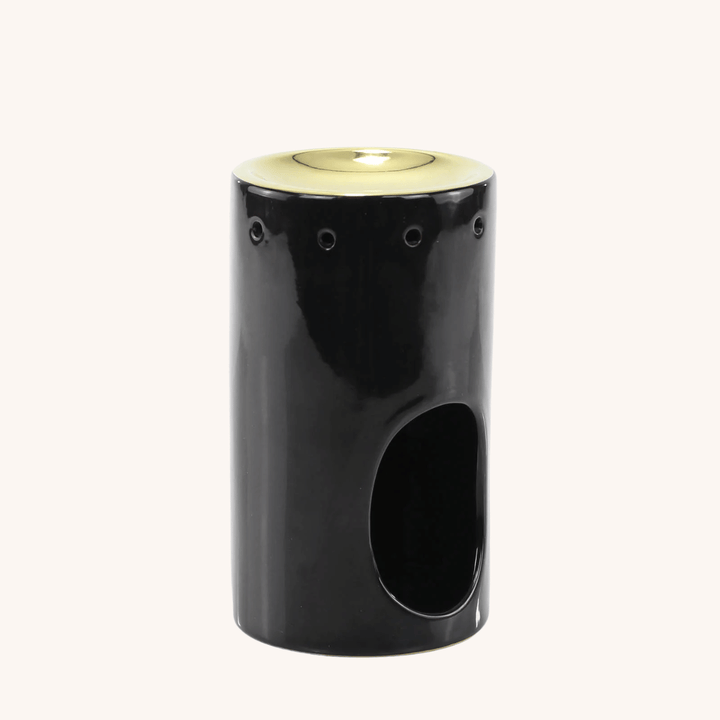 Black &amp; Gold Tower Oil Burner on a white background