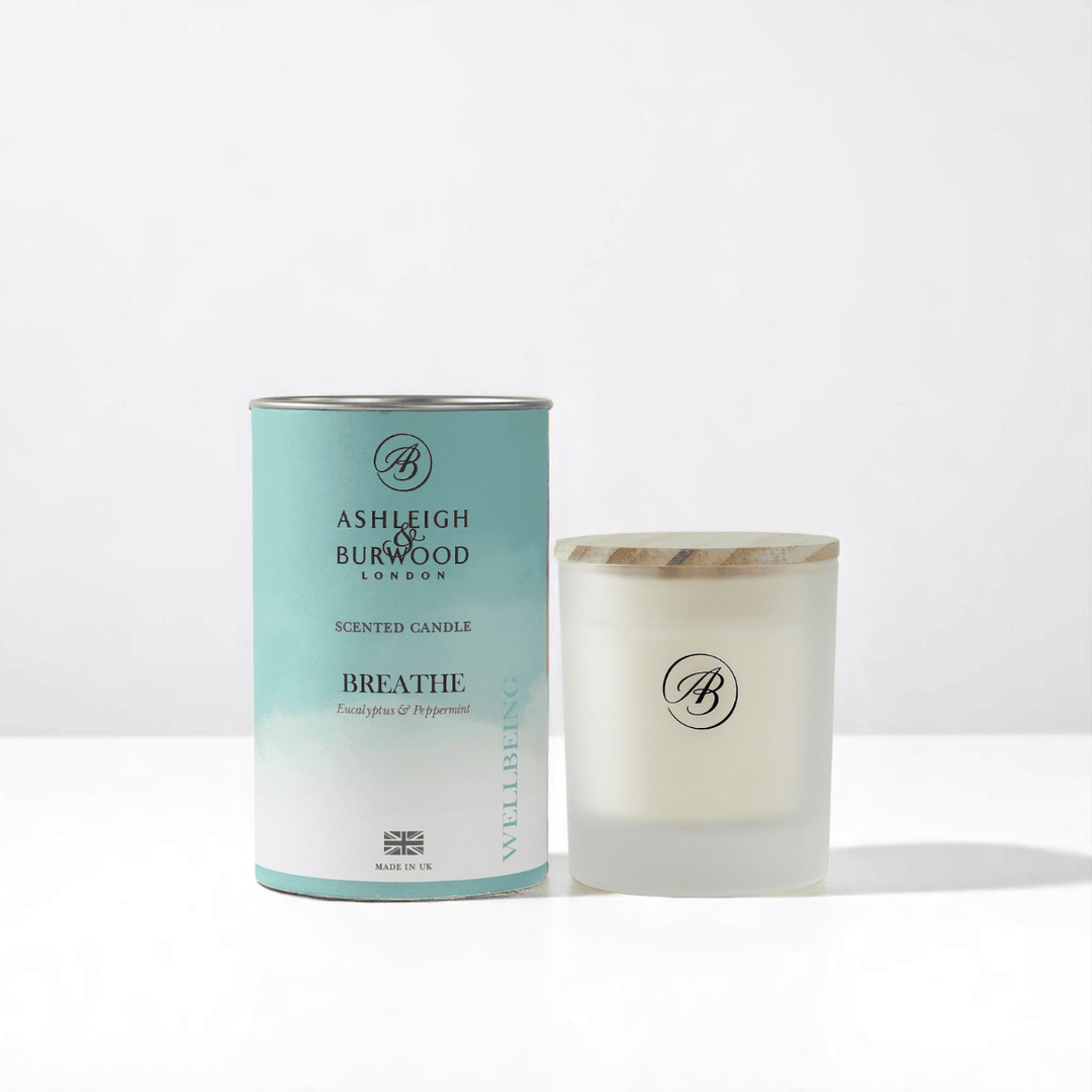 Breathe Wellbeing Scented Candle against a white neutral background