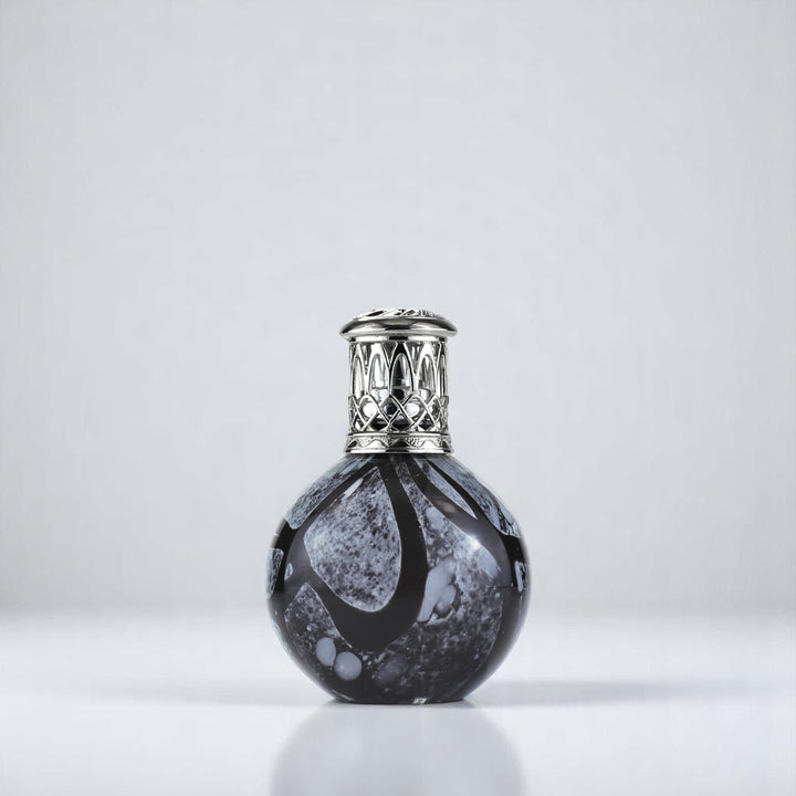 Charcoal Snowball against a white neutral background