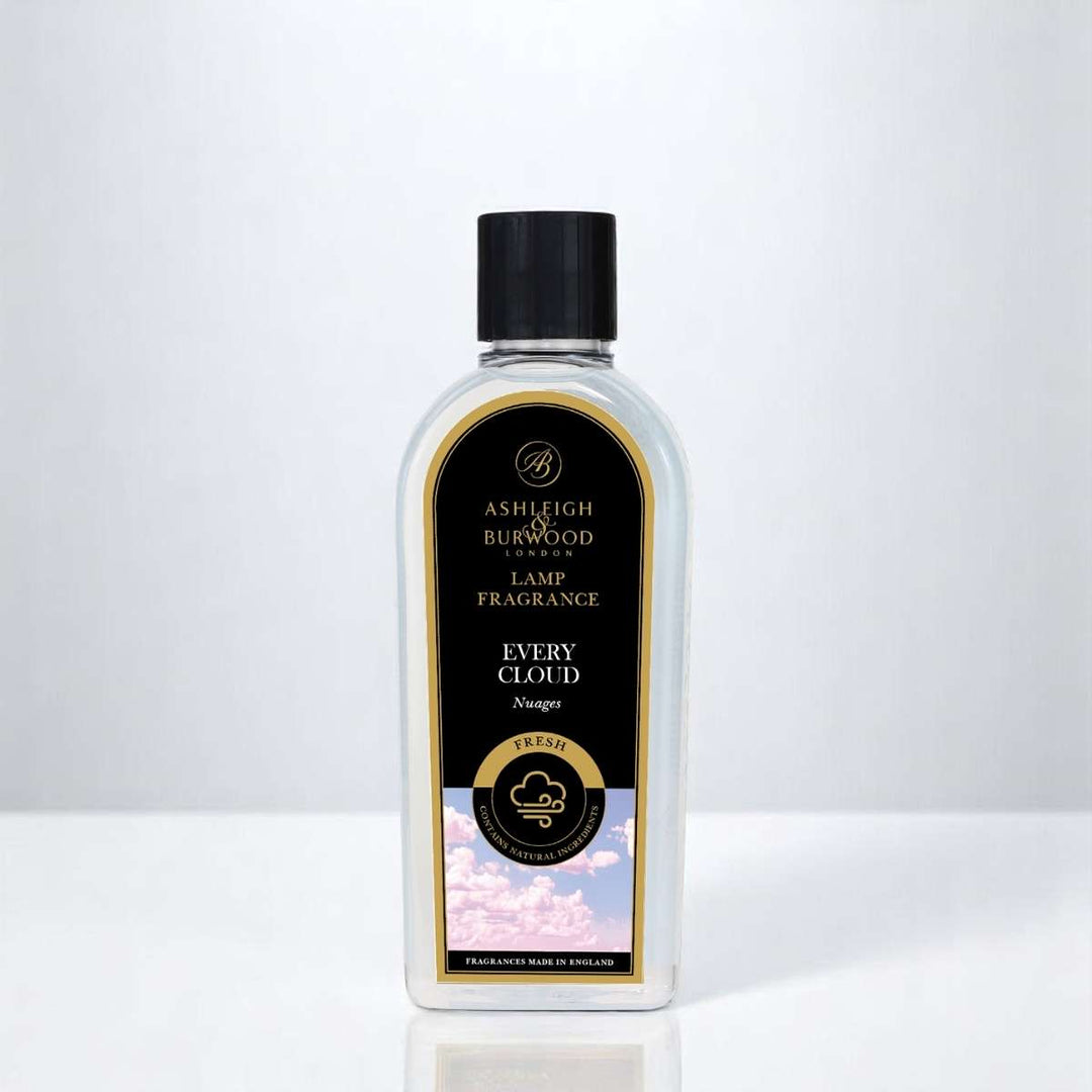 A bottle of Every Cloud Lamp Fragrance against a white neutral background