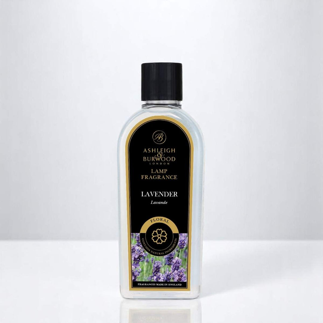 A bottle of Lavender Lamp Fragrance against a white neutral background