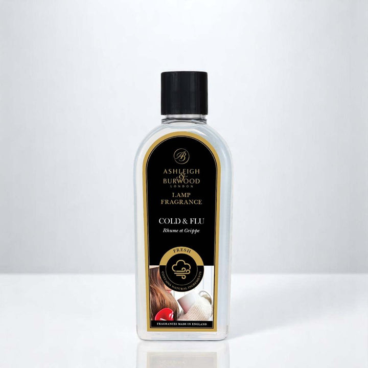 A bottle of Cold & Flu Lamp Fragrance against a white neutral background