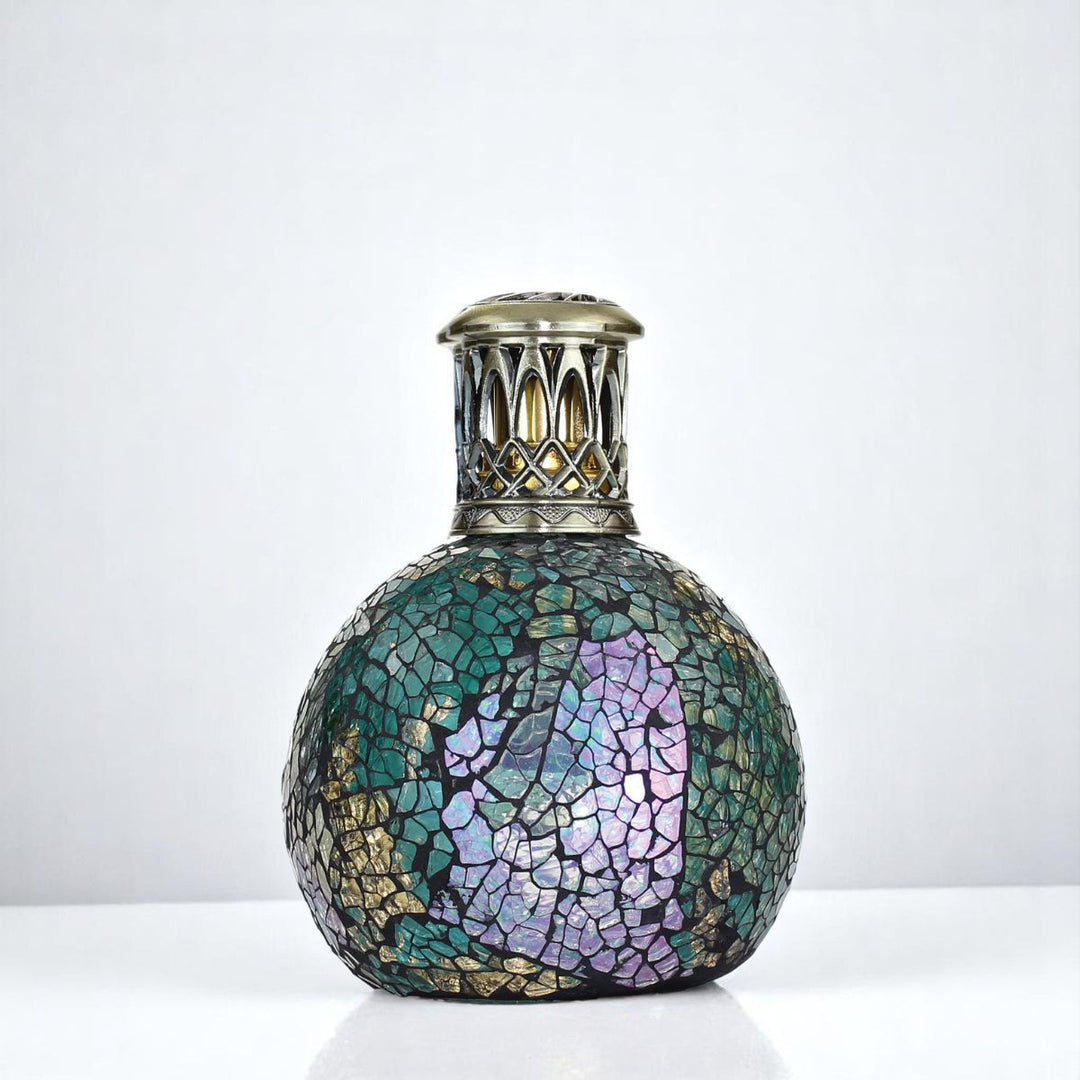 Peacock Feather Fragrance lamp against a white neutral background