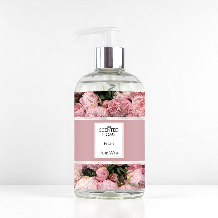 A bottle of Peony Hand Wash against a white neutral background