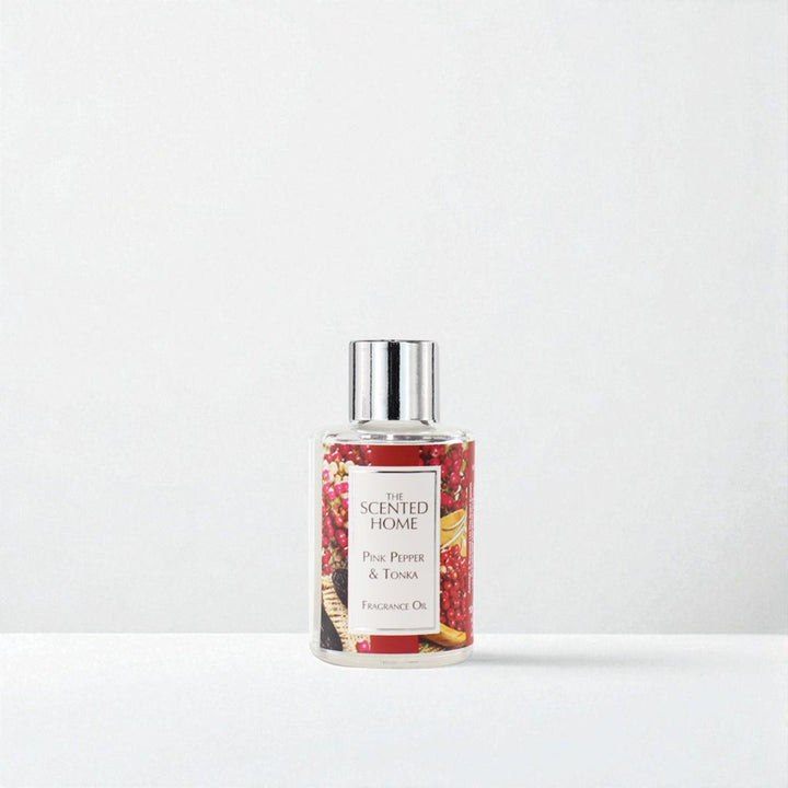 Pink Pepper & Tonka Fragrance Oil against a white neutral background