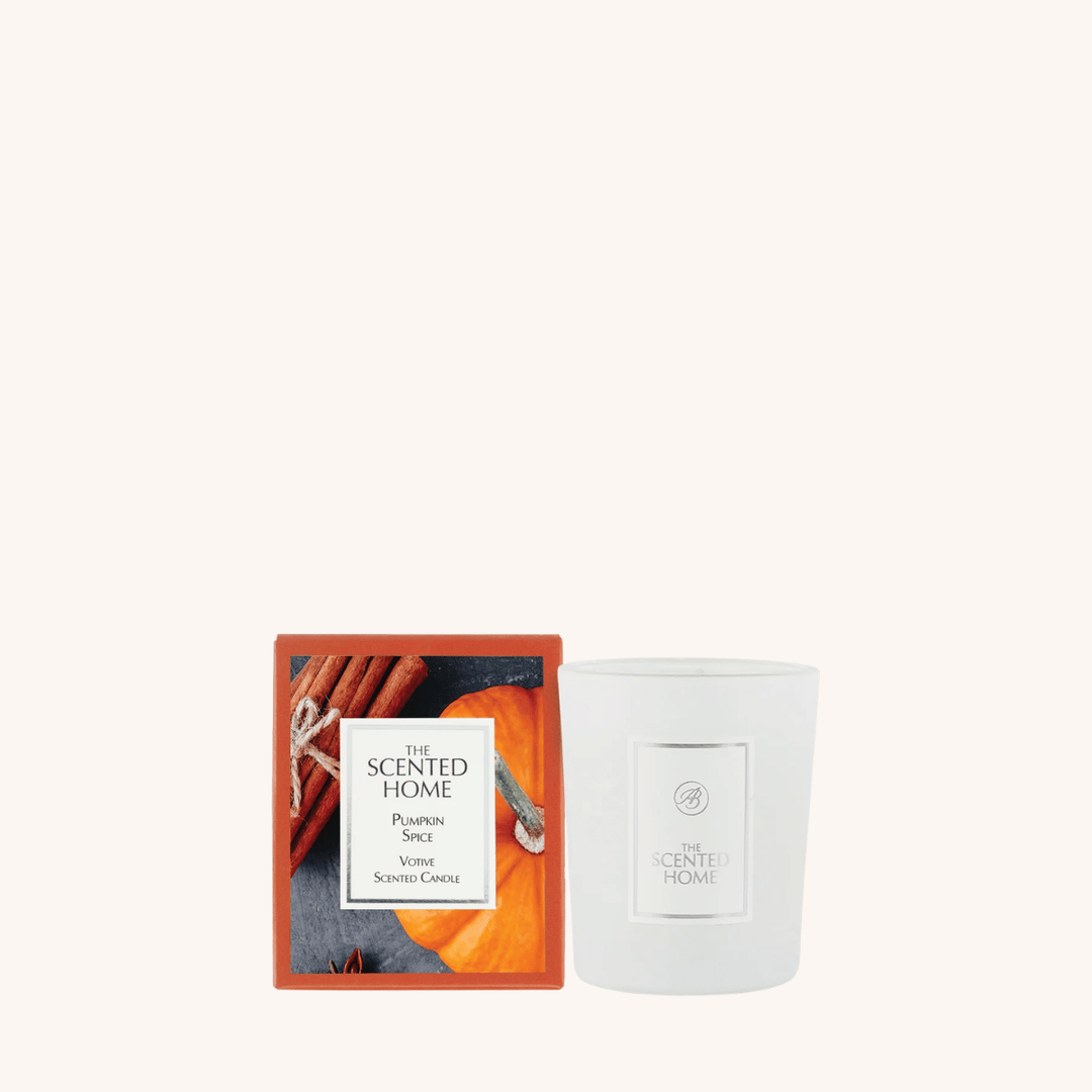 Pumpkin Spice Scented Votive Candle on a white background