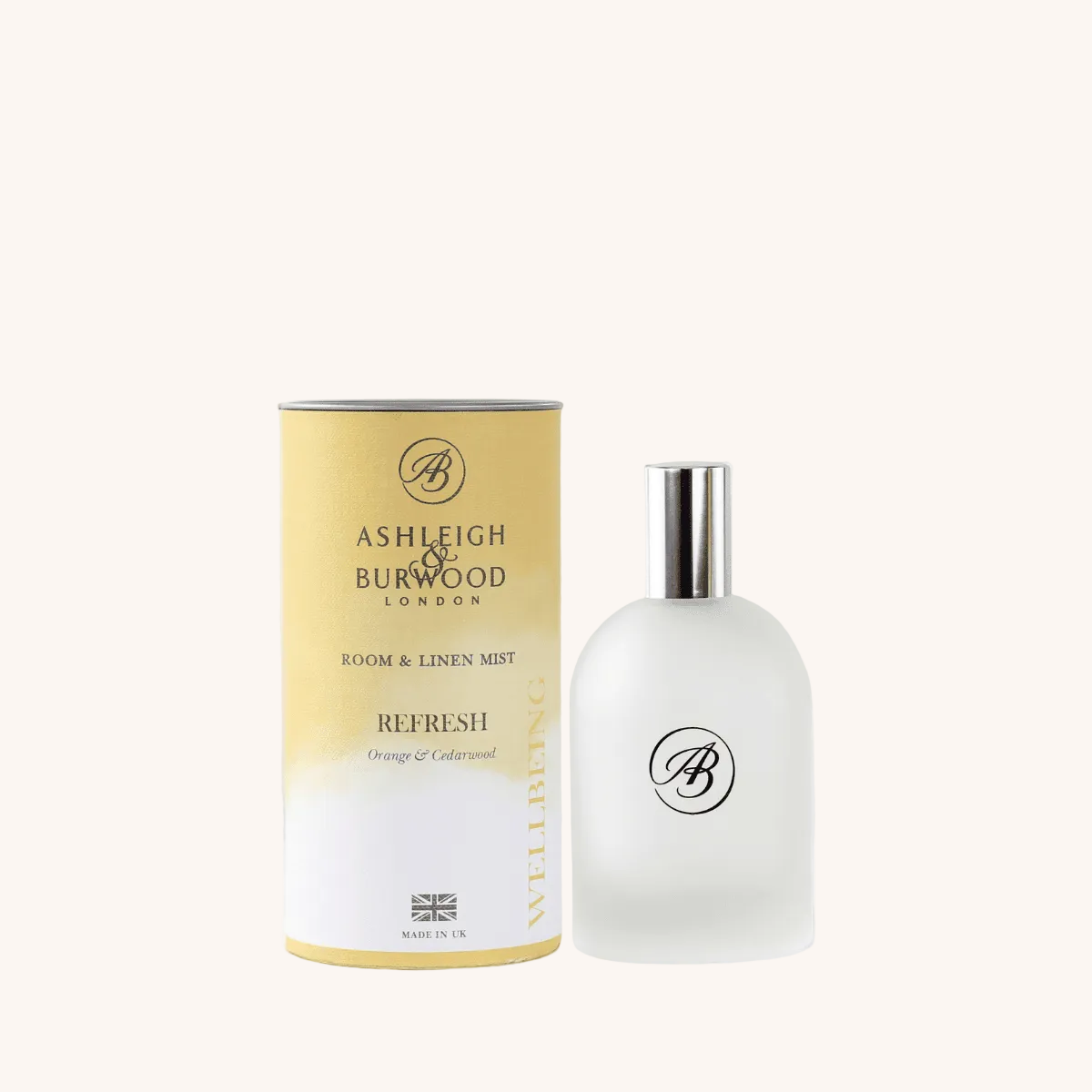 A bottle of Refresh Room Spray against a white neutral background