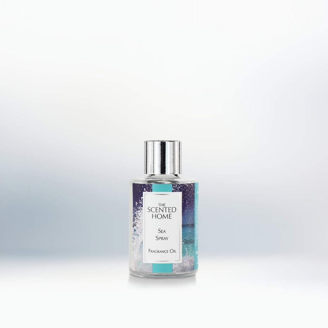 A bottle of Sea Spray Fragrance Oil against a neutral background