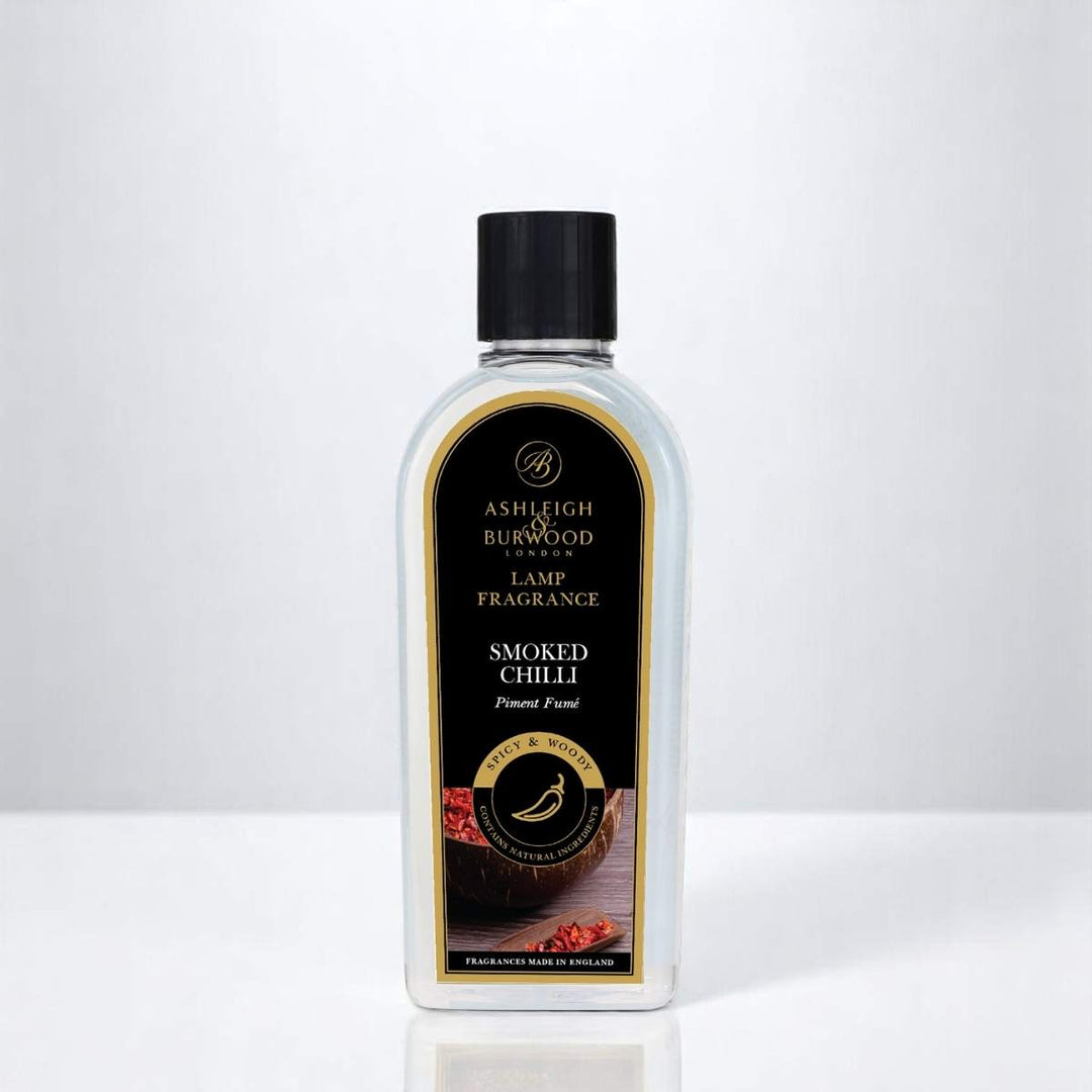 A bottle of Smoked Chilli Lamp Fragrance against a white neutral background