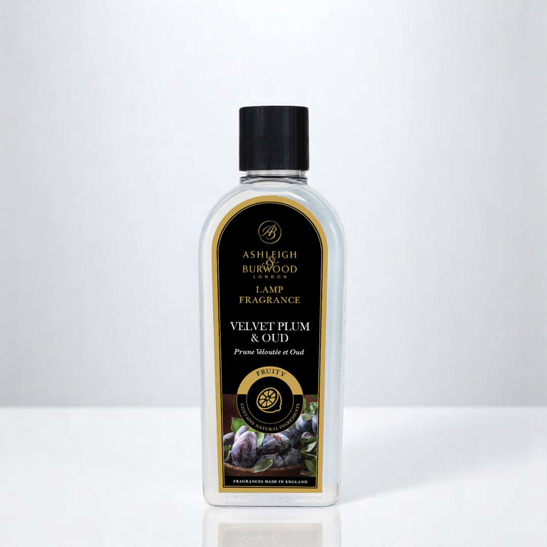 Bottle of Ashleigh & Burwood lamp fragrance with black cap on a white background