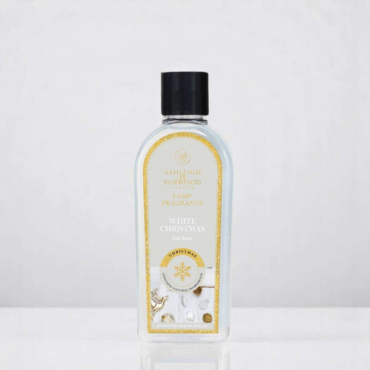 A bottle of White Christmas Lamp Fragrance against a white neutral background