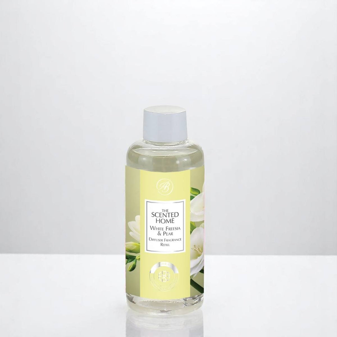Our White Freesia & Pear Reed Diffuser Refill on a neutral white background