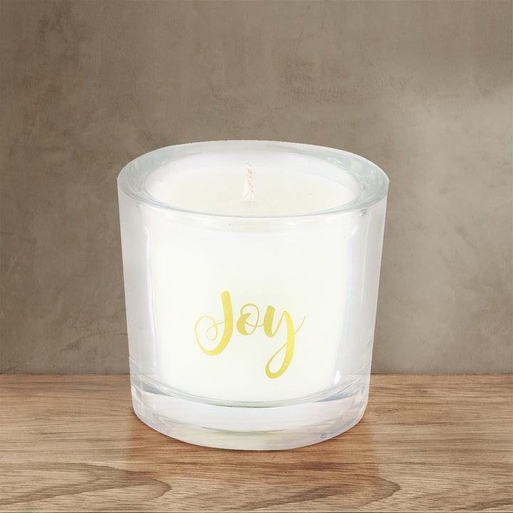 Joy Scented Votive on wooden table