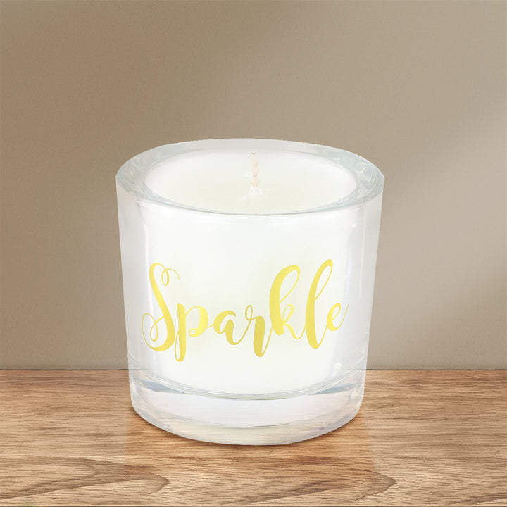 'Sparkle' Scented Candle on a brown wooden table