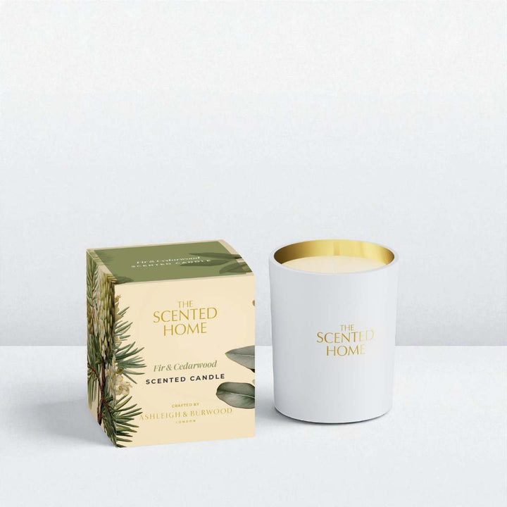 Scented candle with packaging on a light gray background