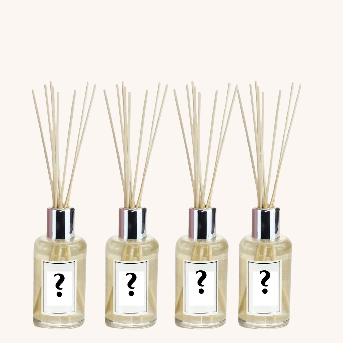 Four diffuser bottles with reeds and question mark labels on a white background