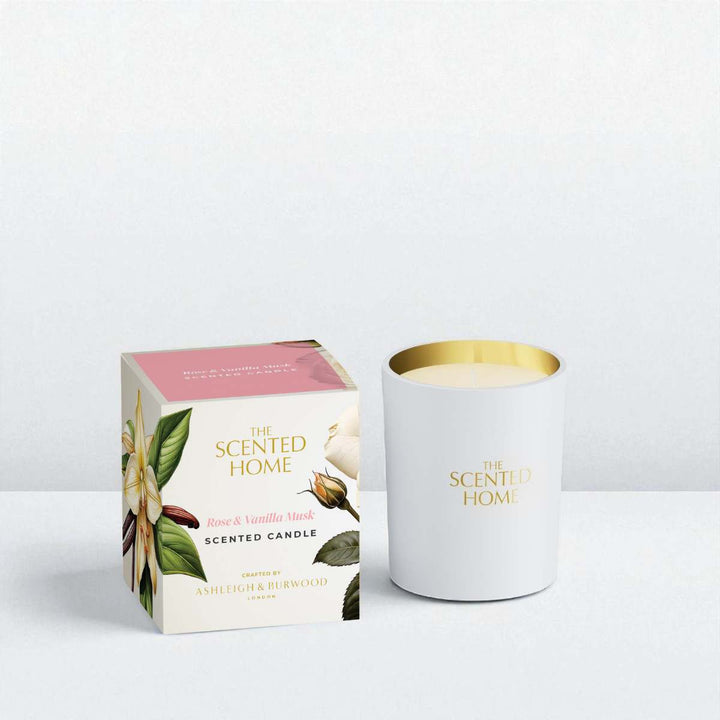 Scented candle with packaging on a light gray background