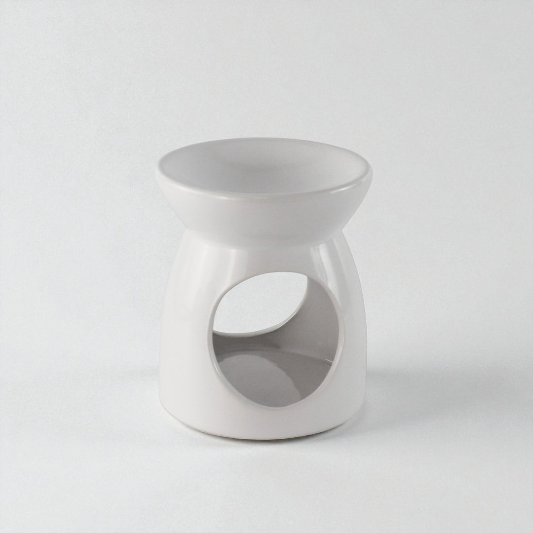 White ceramic table with a unique design on a light gray background