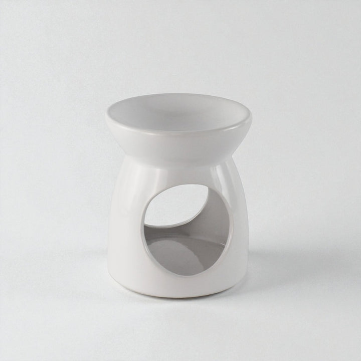 White ceramic table with a unique design on a light gray background